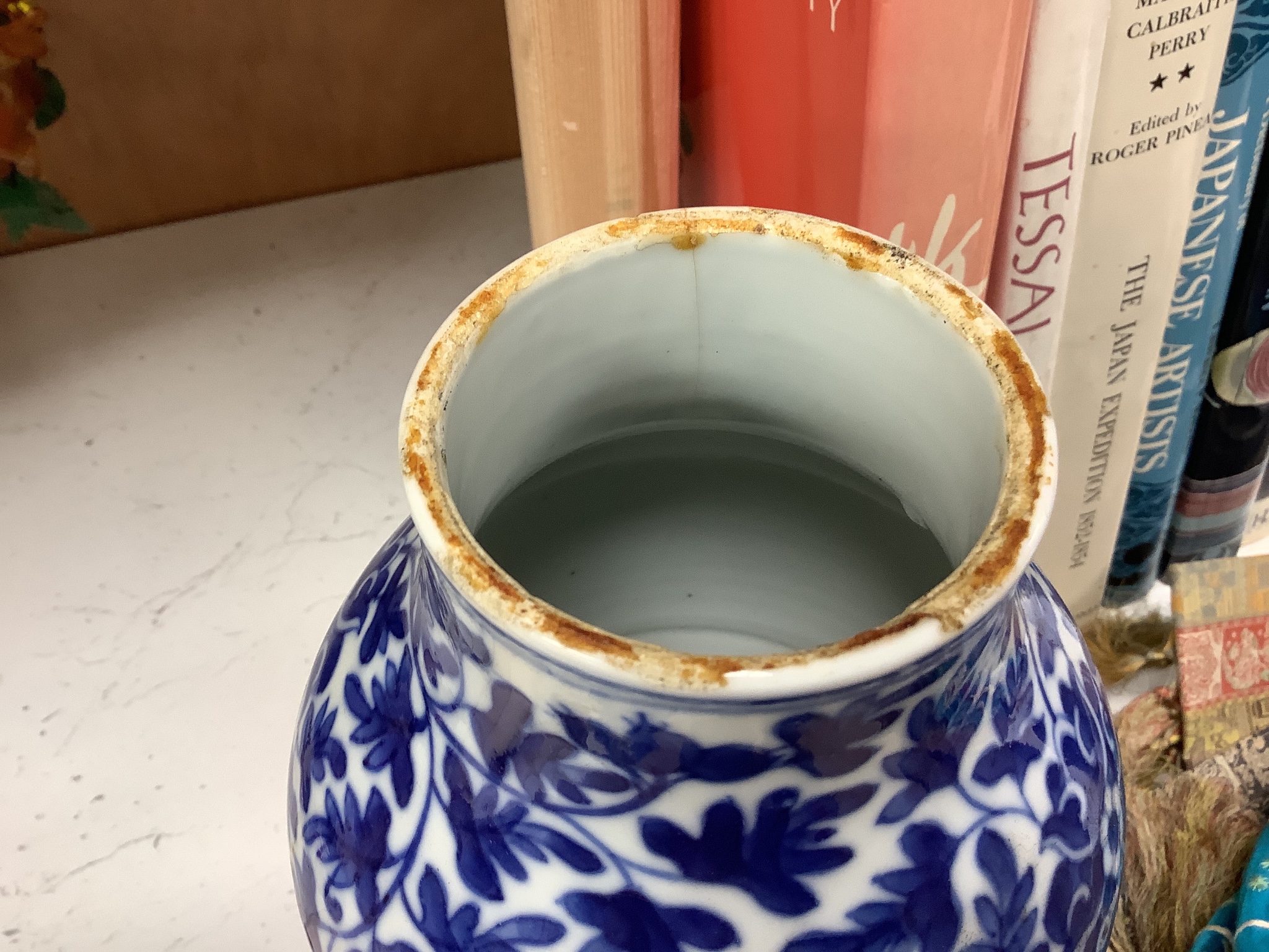 A 19th century Chinese blue and white vase, a similar crackle glaze vase and a powder blue jar, mounted as a lamp, tallest 32cm